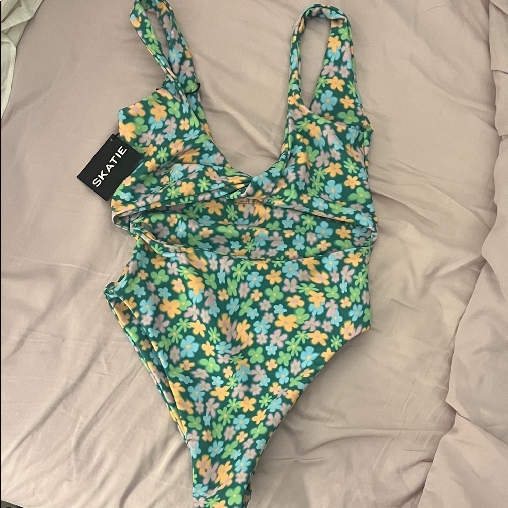 Skatie twisted front cut out Floral One-Piece Swimsuit